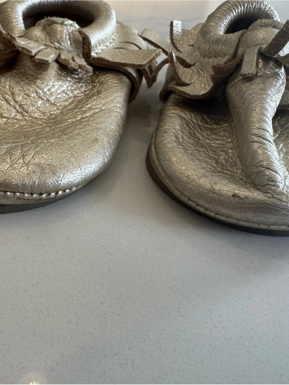 Freshly Picked Metallic Gold Fringe Baby Moccasins